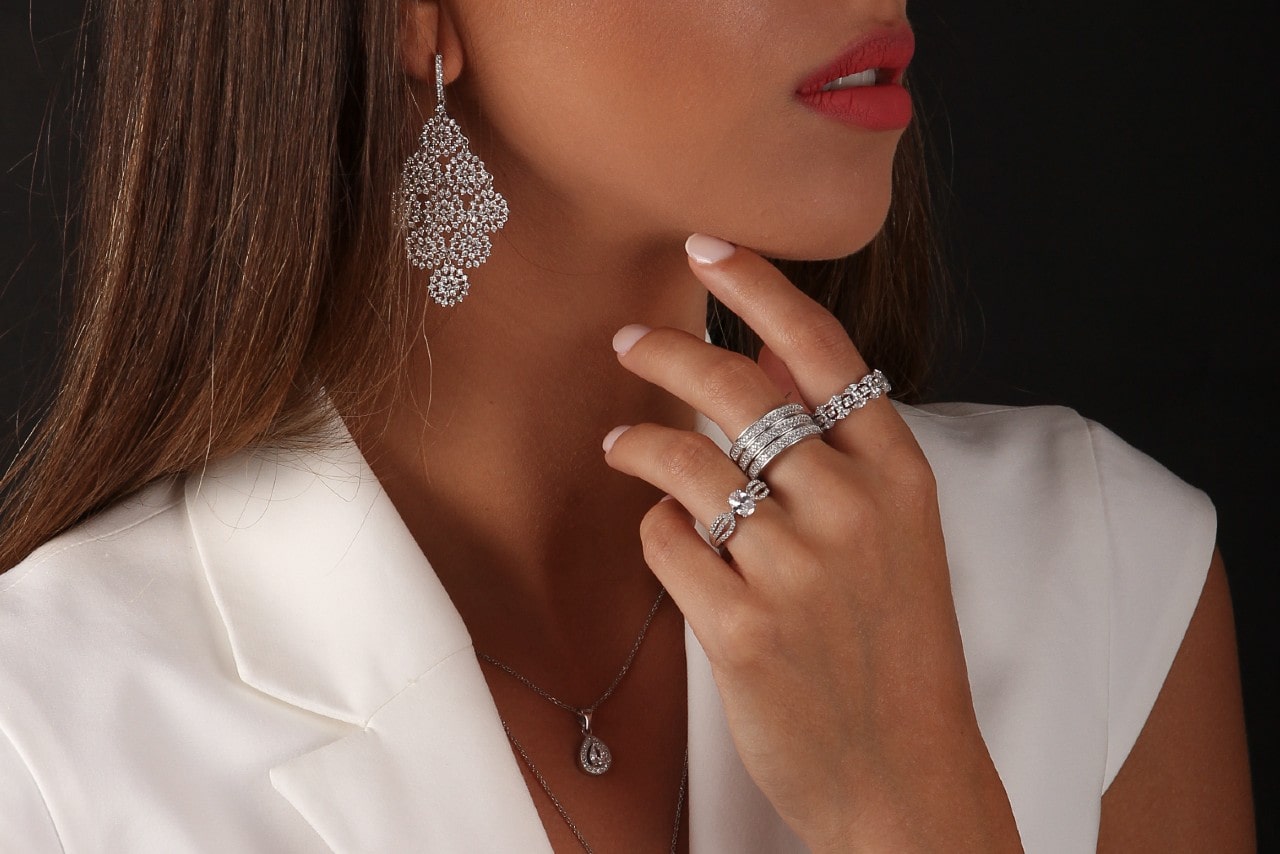 Fashionably dressed lady wearing various pieces of jewellery Fashionably dressed lady wearing various pieces of jewellery