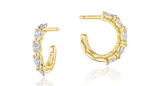 A pair of TACORI yellow gold huggie earrings with diamond details, available at Prestige Jewellers.